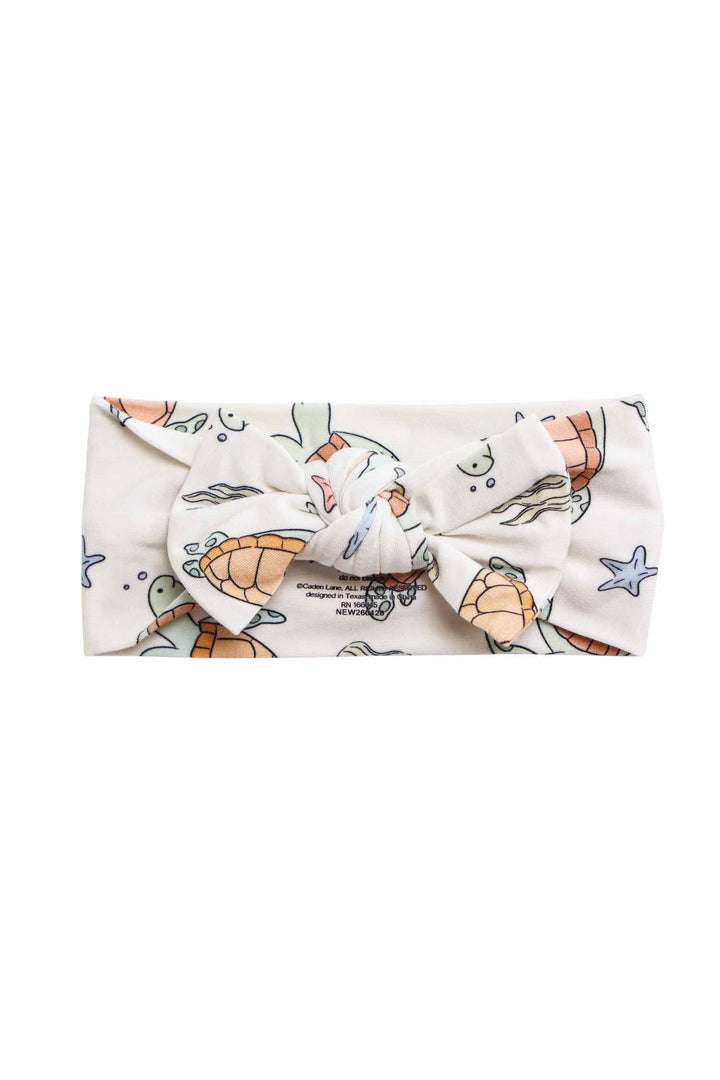 knit large bow headwrap in turtley rad turtle print – baby girl accessory