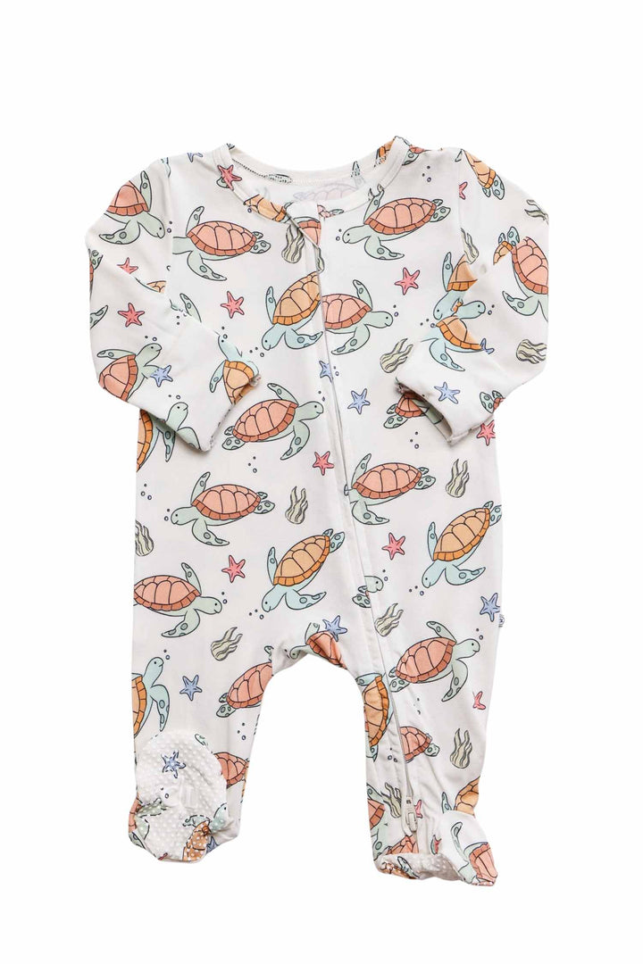 back view of turtley rad bamboo zipper footie showing full turtle print pattern
