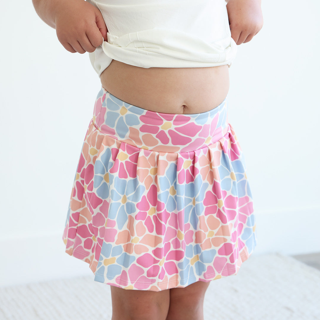 girl's athletic tennis skirt with shorts pink, blue and orange flowers