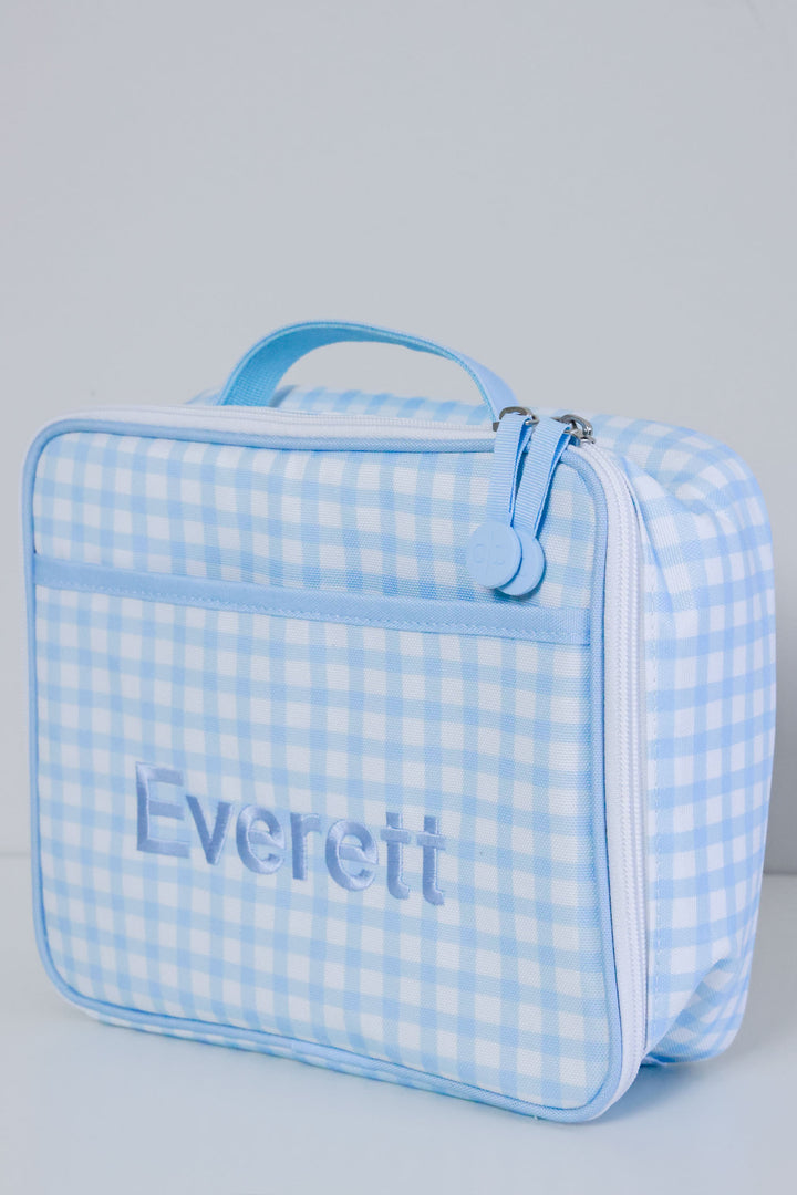 side view of embroidered blue gingham lunchbox 