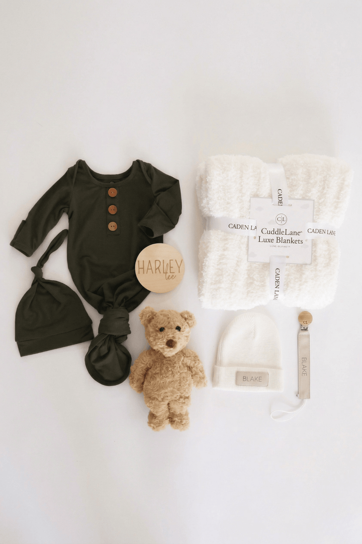 baby shower gift box bundle with neutral earthy tone knotgown, blanket, bear stuffed toy, beanie