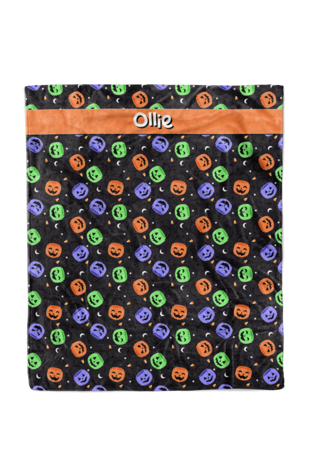 Personalized Halloween pet blanket, 50x60, in black fleece with purple, green, and orange jack-o-lantern print and an orange stripe customized with the name Ollie