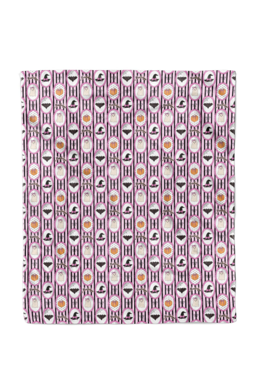 Pink and black Halloween blanket fabric with ghost, bat, pumpkin, and heart pattern.