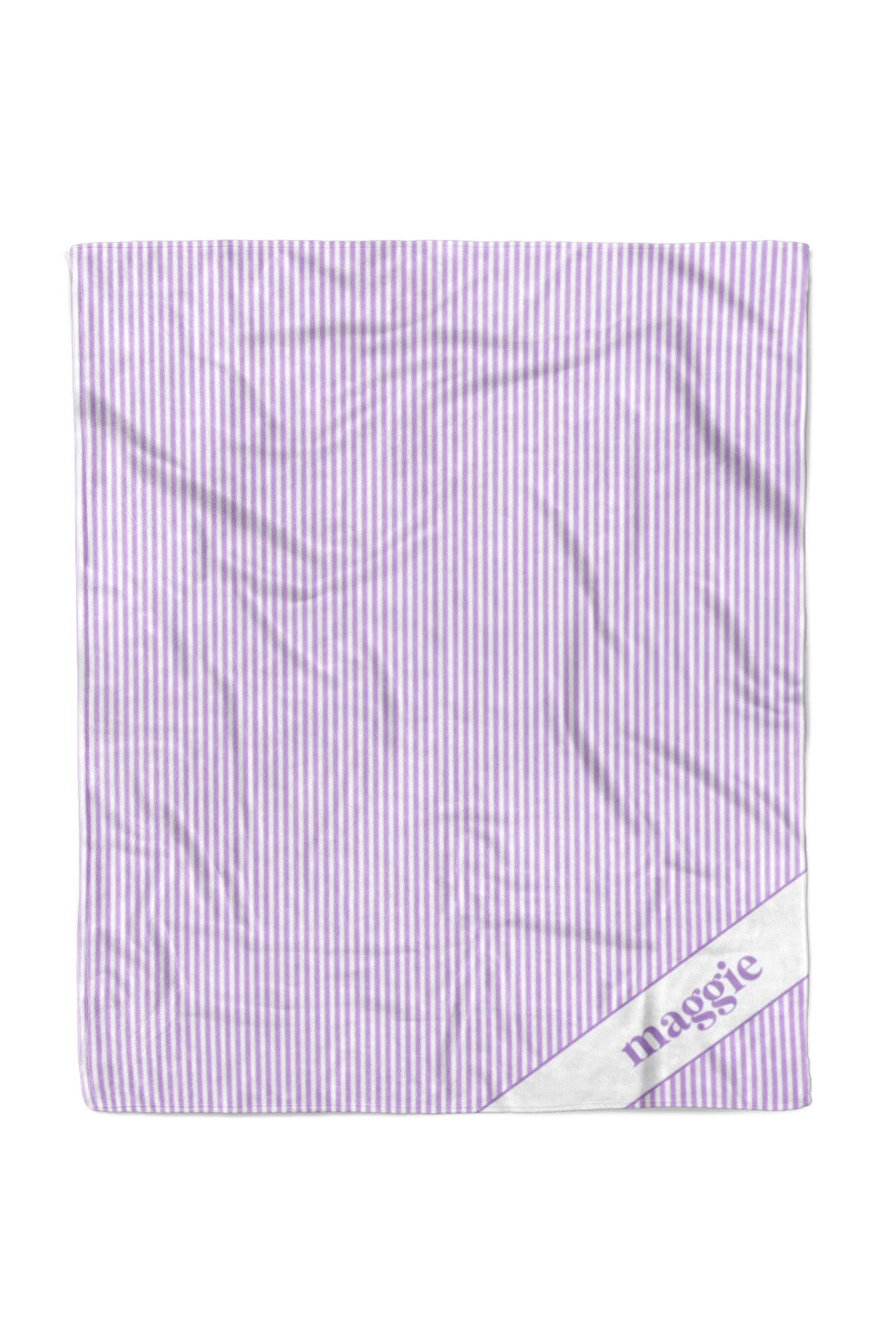 Personalized pet blanket in lavender and white vertical stripes with the name maggie embroidered in purple script on a white satin corner patch