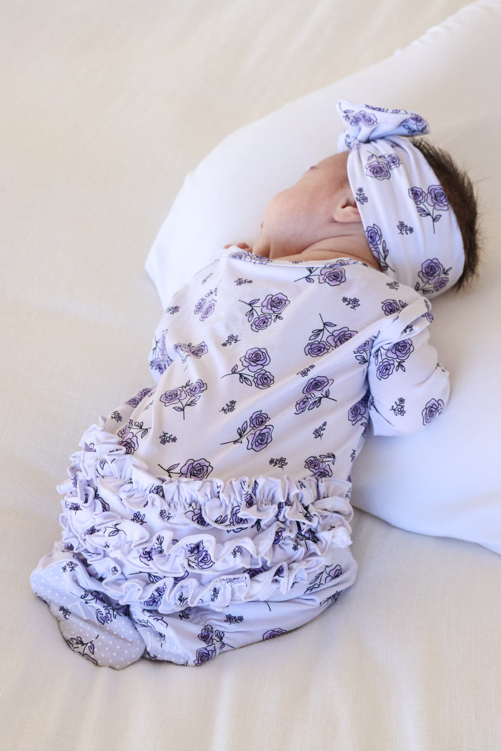 back view of amethyst garden ruffle zipper footie for baby girls 