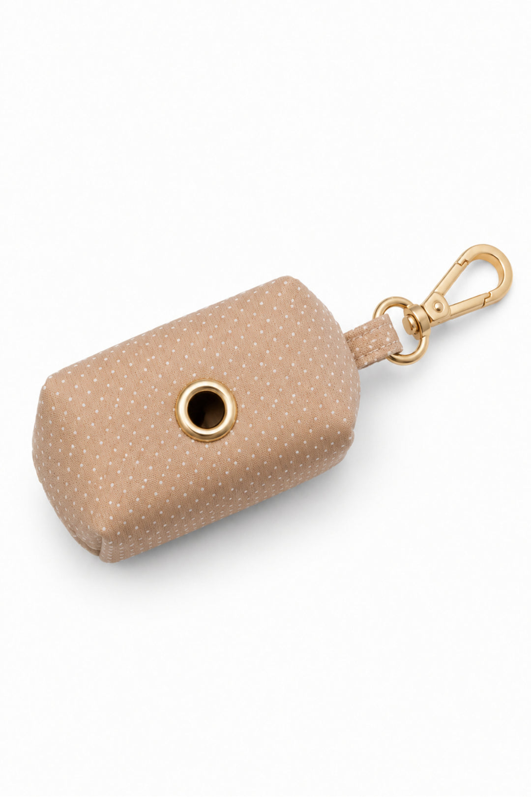 Bottom view of latte brown polka dot pet waste bag holder showing the dispensing opening and gold carabiner clip
