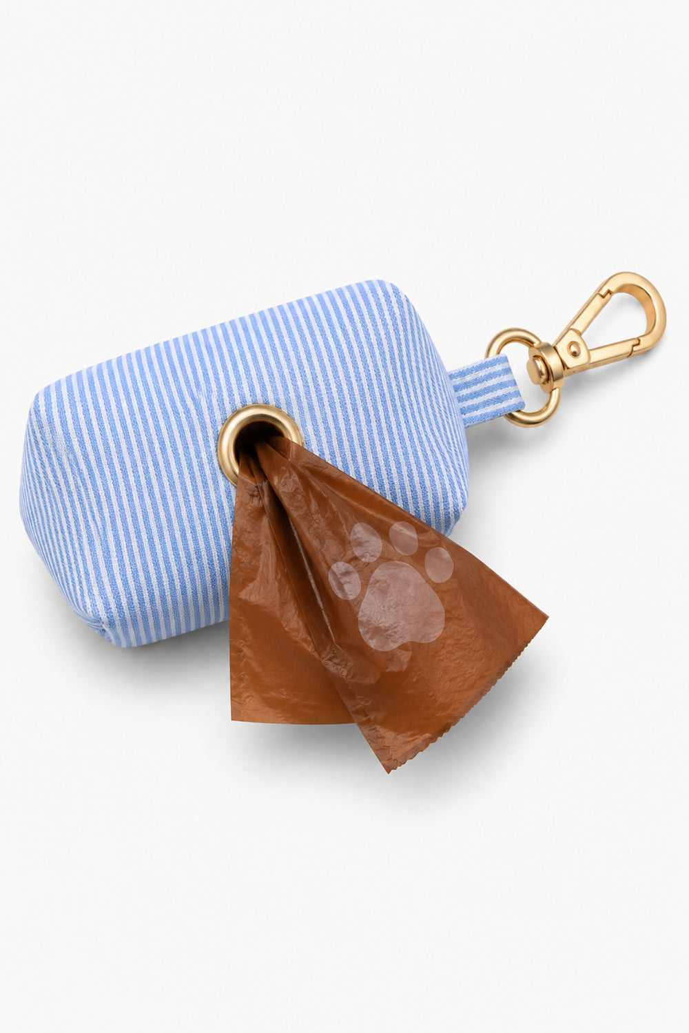 Light blue and white striped Morning Mist pet waste bag holder with a brown waste bag being dispensed from the opening, gold clip attachment visible