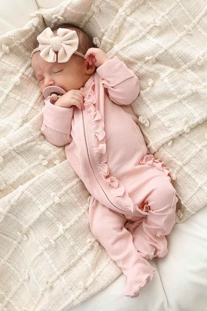 light pink waffle bamboo zipper ruffle footie 