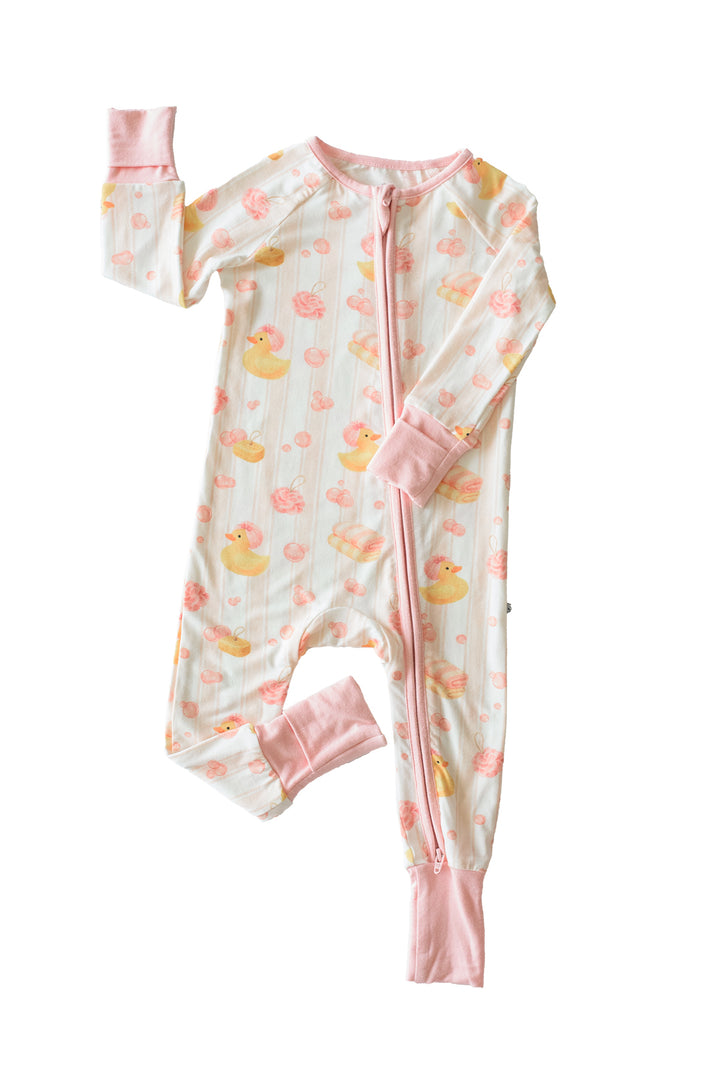 Pink Bubble Duckies convertible zip romper pajamas flat lay showing double zipper front and yellow rubber duck print