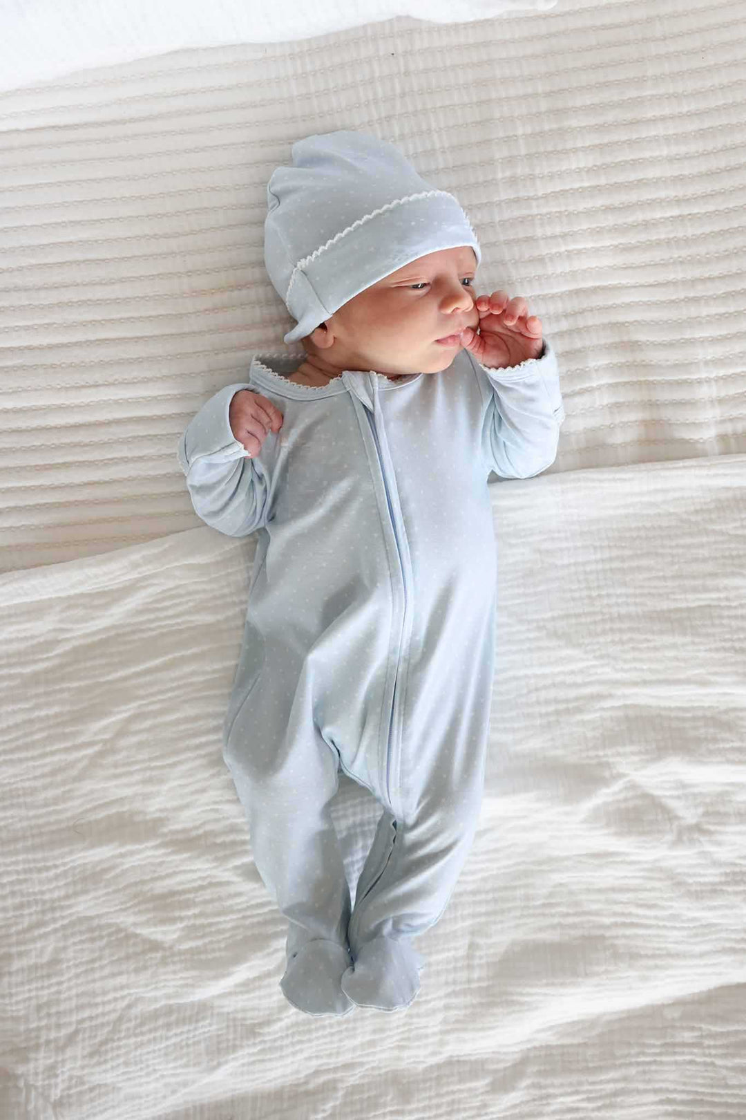 blue picot trim bamboo footie on baby