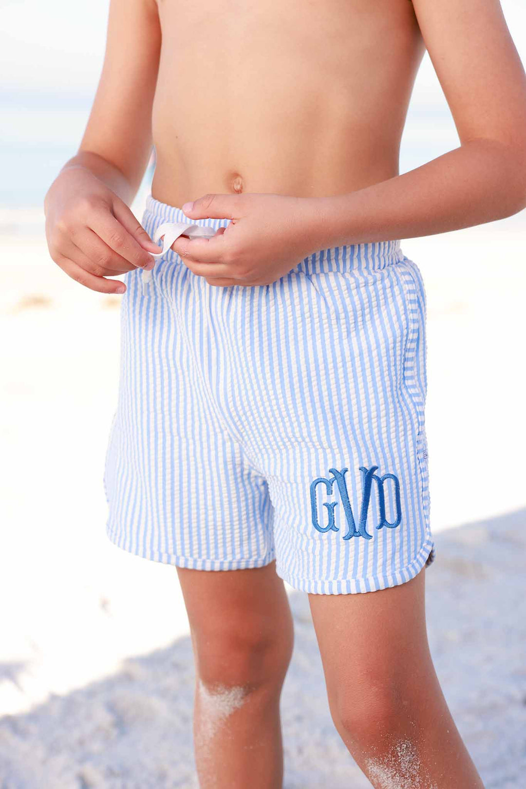 monogram blue seersucker swim trunks for boys