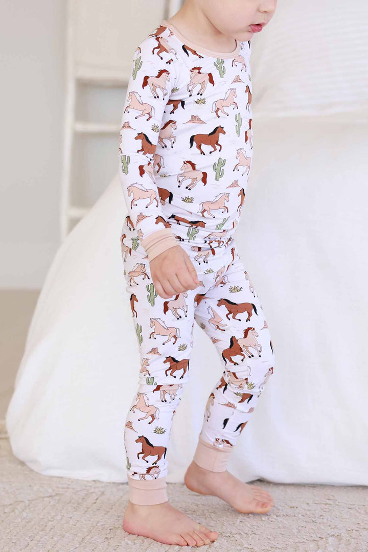 standing boy in pony club two piece pajama set 