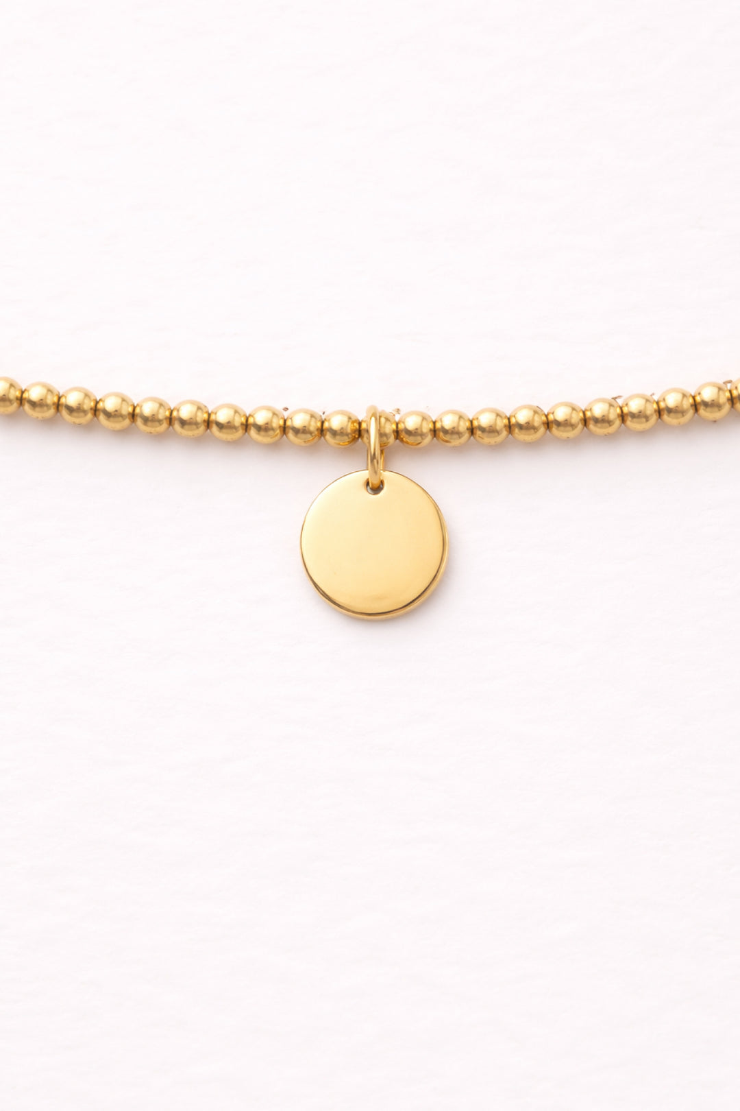 round charm beaded bracelet