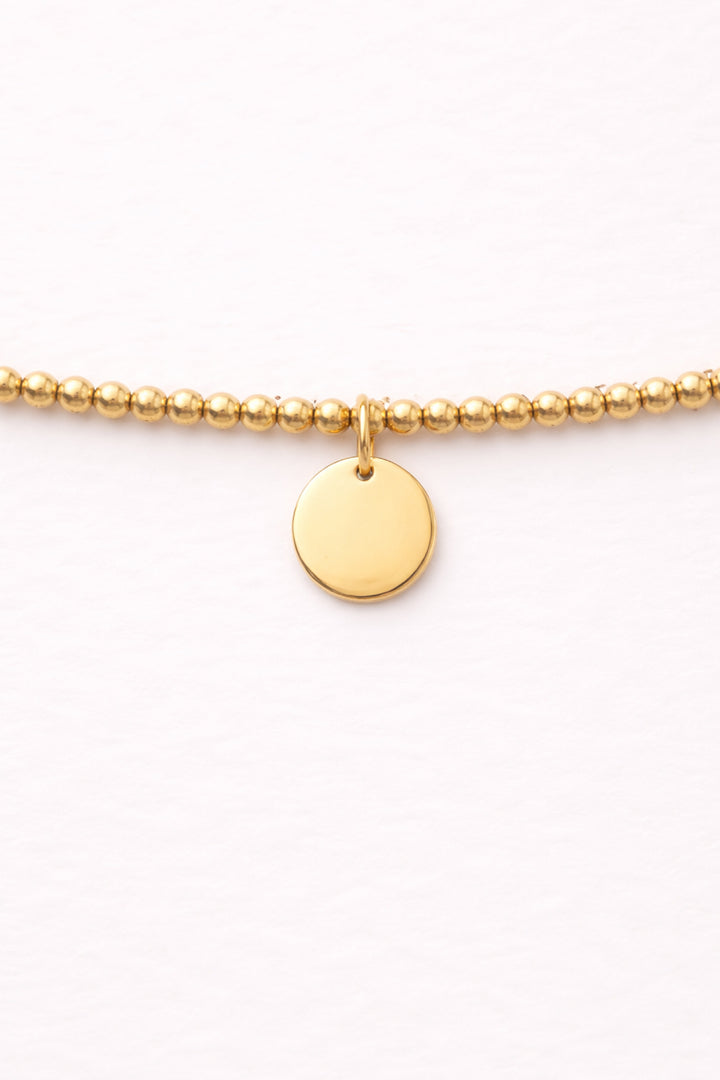 round charm beaded bracelet