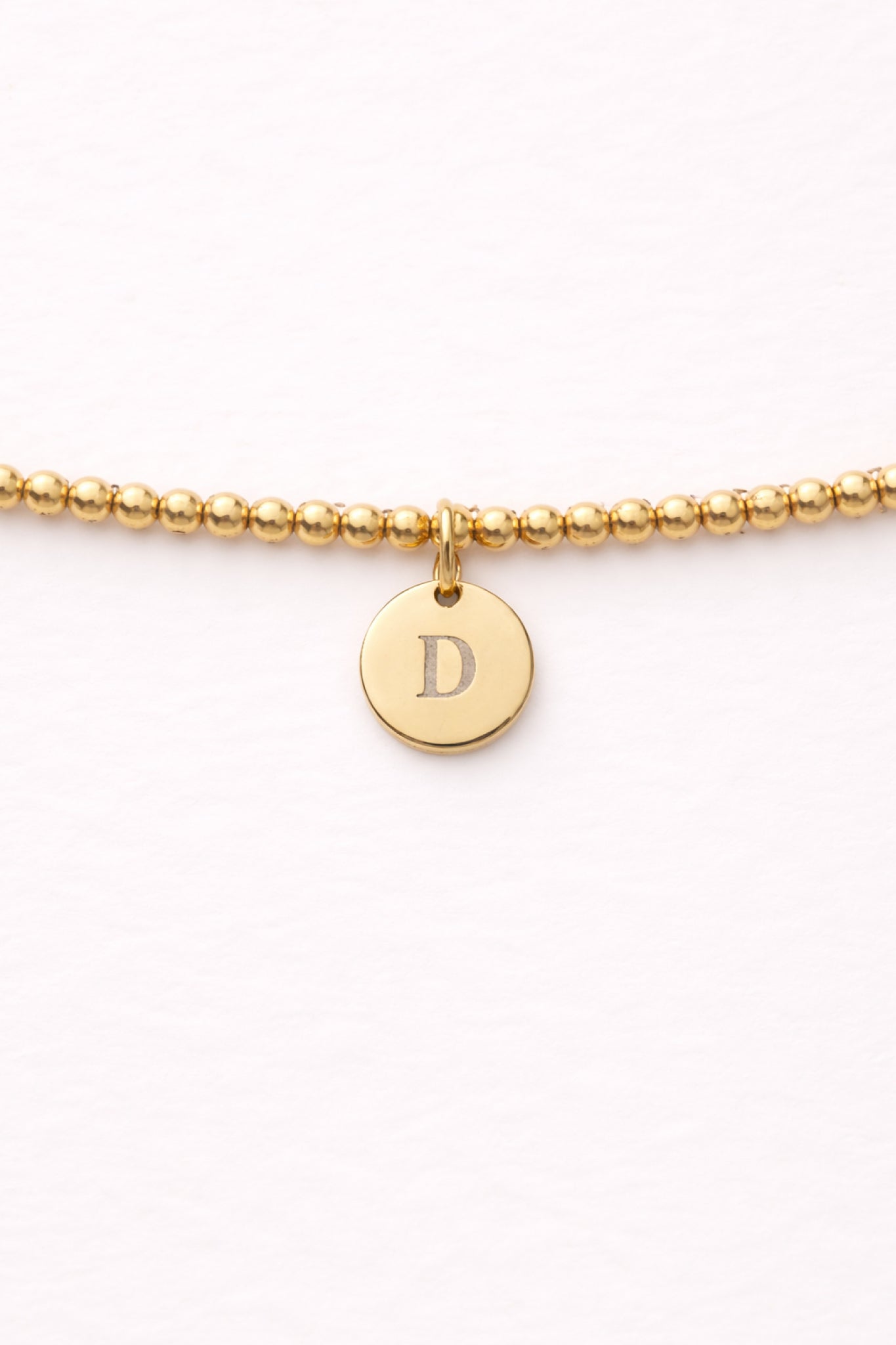 Engraved Circle Charm Beaded Bracelet