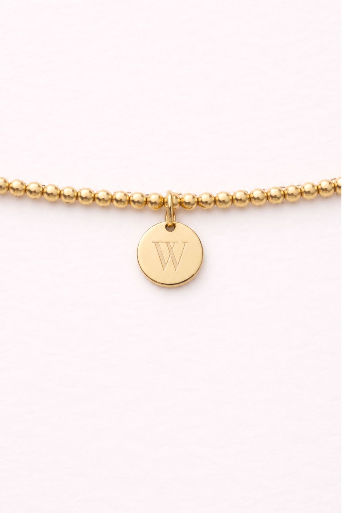 Engraved Circle Charm Beaded Bracelet