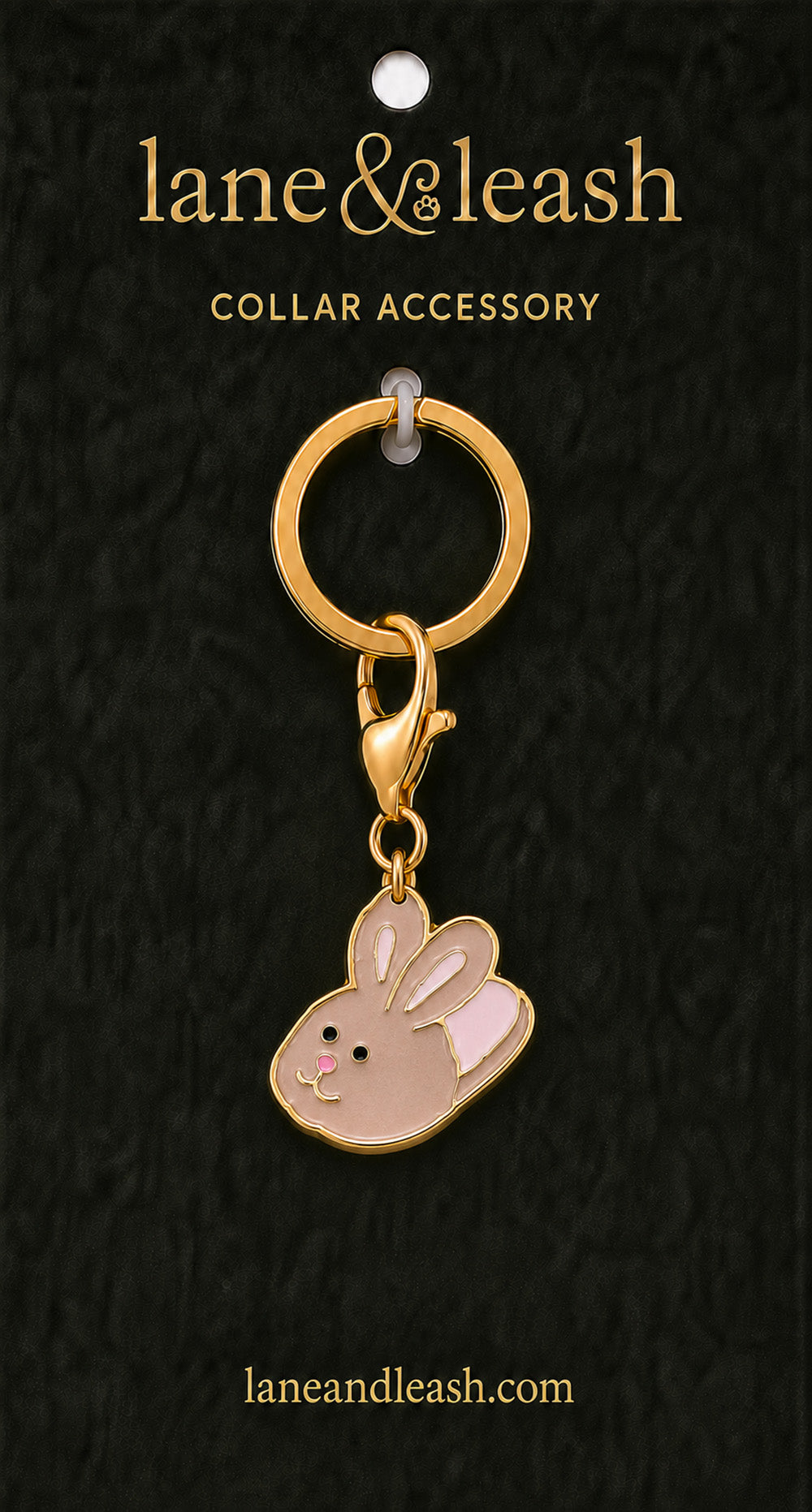 Pink bunny slipper Lane & Leash collar accessory charm on dark green packaging card with lobster claw clasp and jump ring