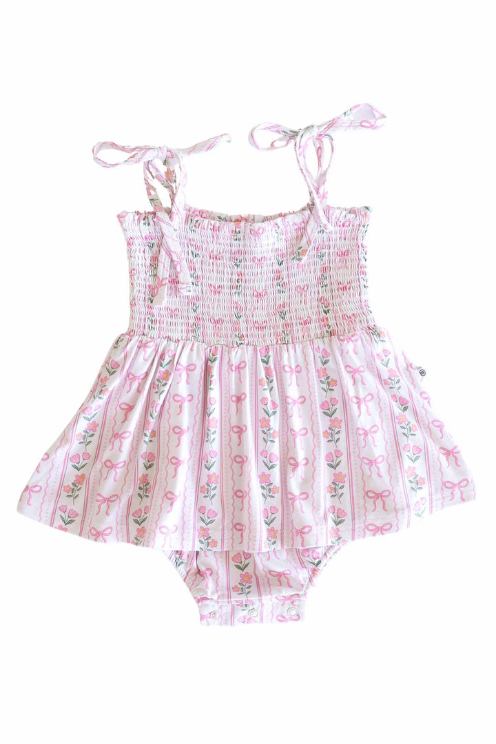 bamboo smocked twirl bodysuit with coquette garden bow and flower print