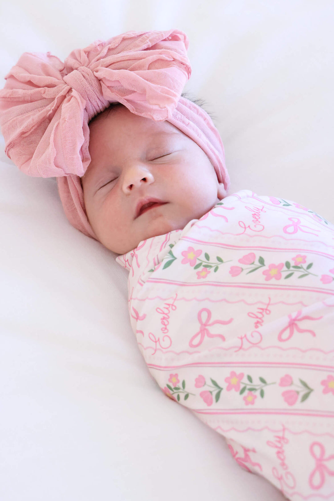 caden lane coquette garden personalized swaddle blanket - bows and blooms
