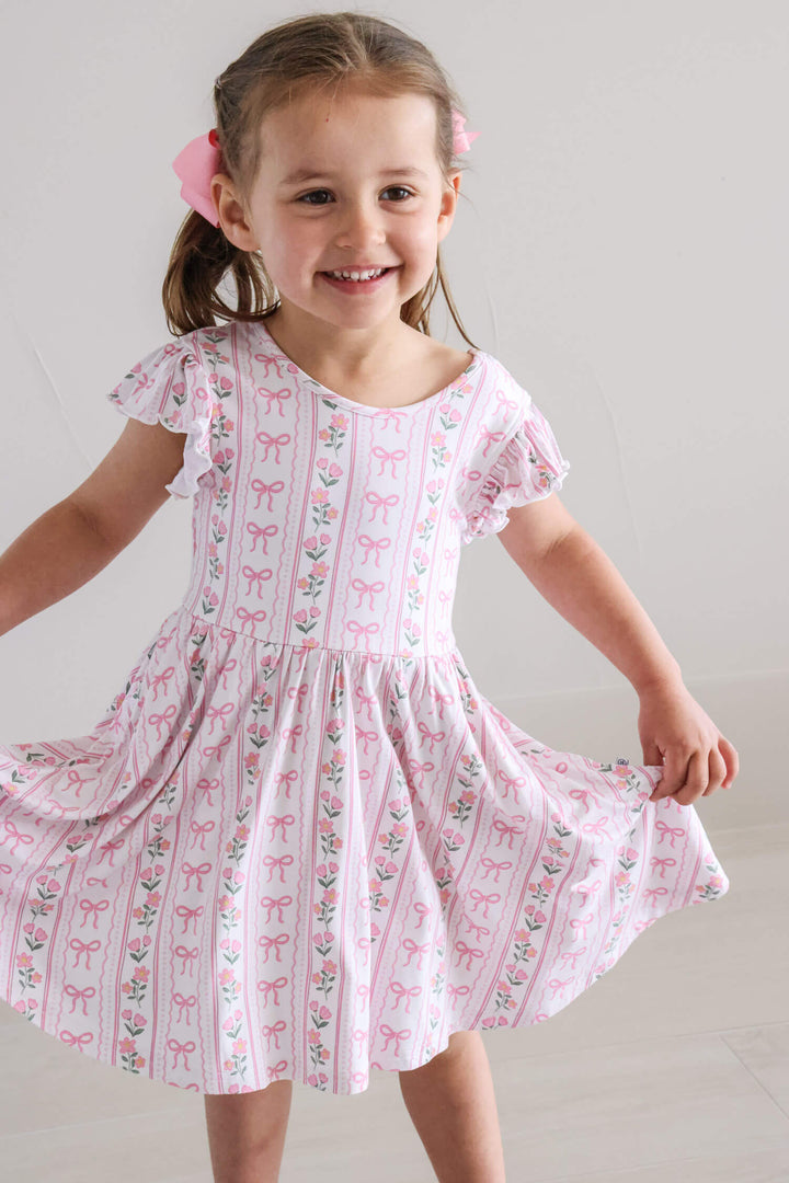 caden lane ruffle twirl dress in coquette garden floral print