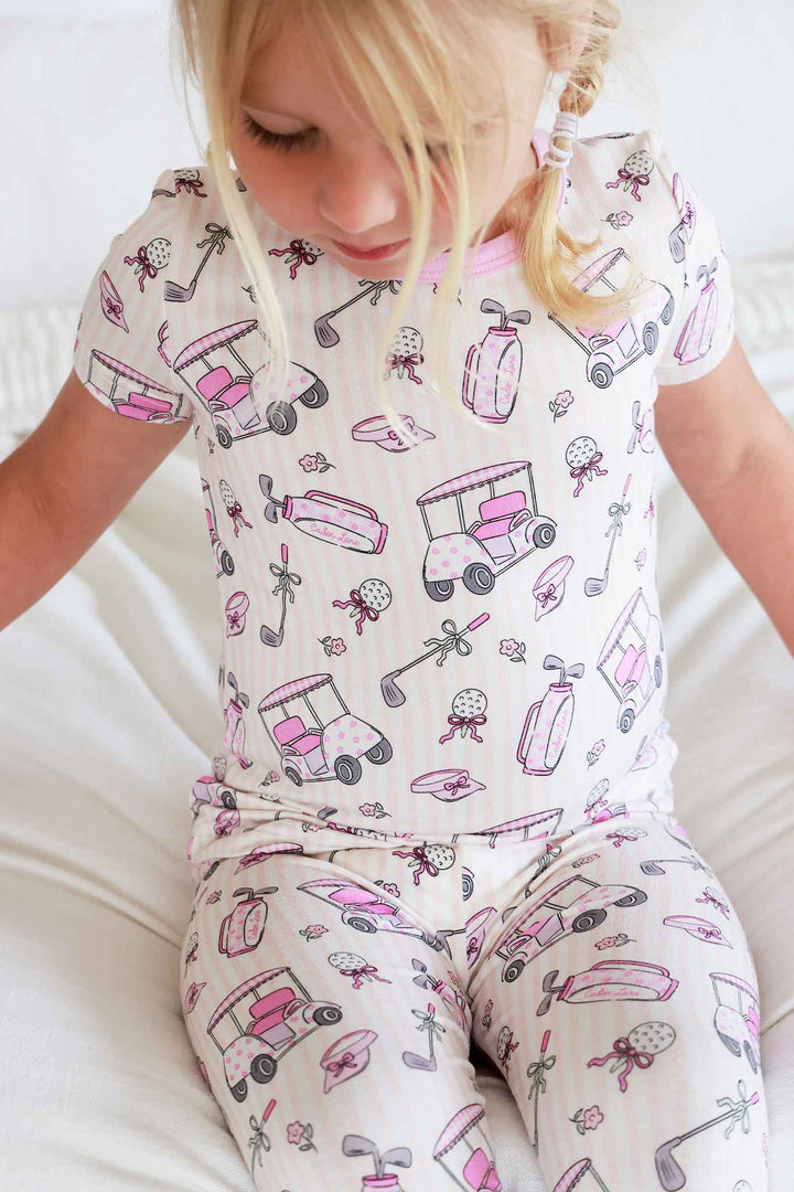 closeup of caddie crew pink two piece pajama set