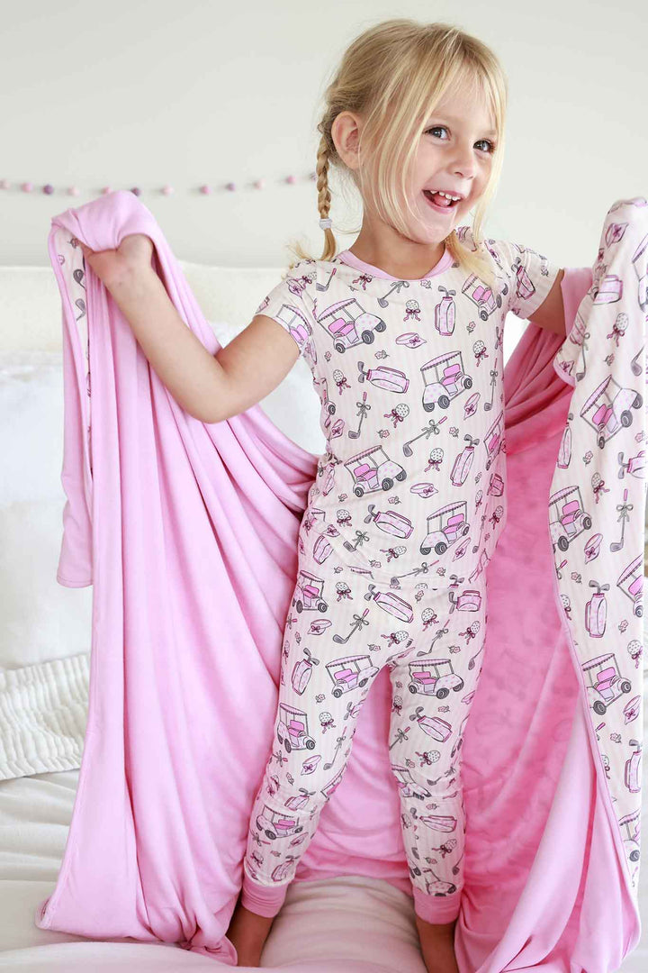 caddie crew pink two piece pajama set with matching bamboo blanket