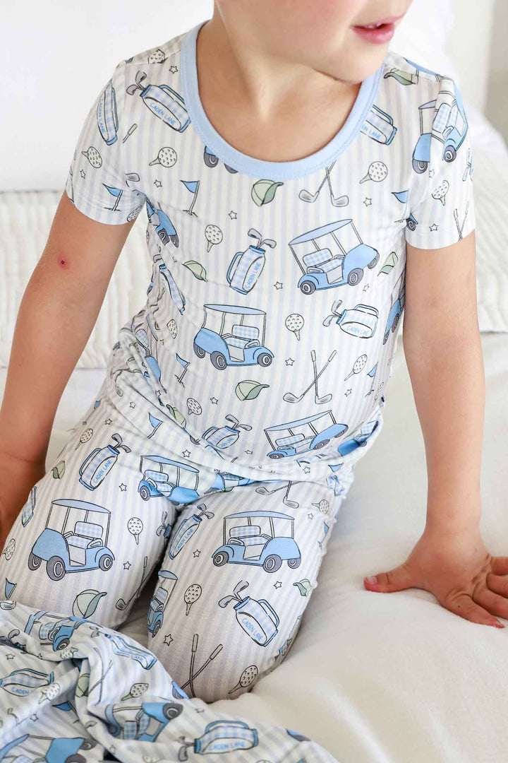 closeup of caddie crew blue two piece