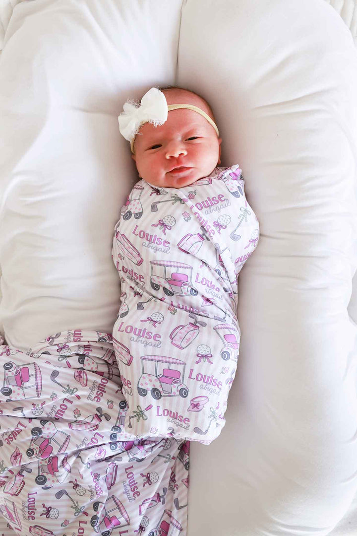 golf caddie crew pink personalized swaddle blanket, styled