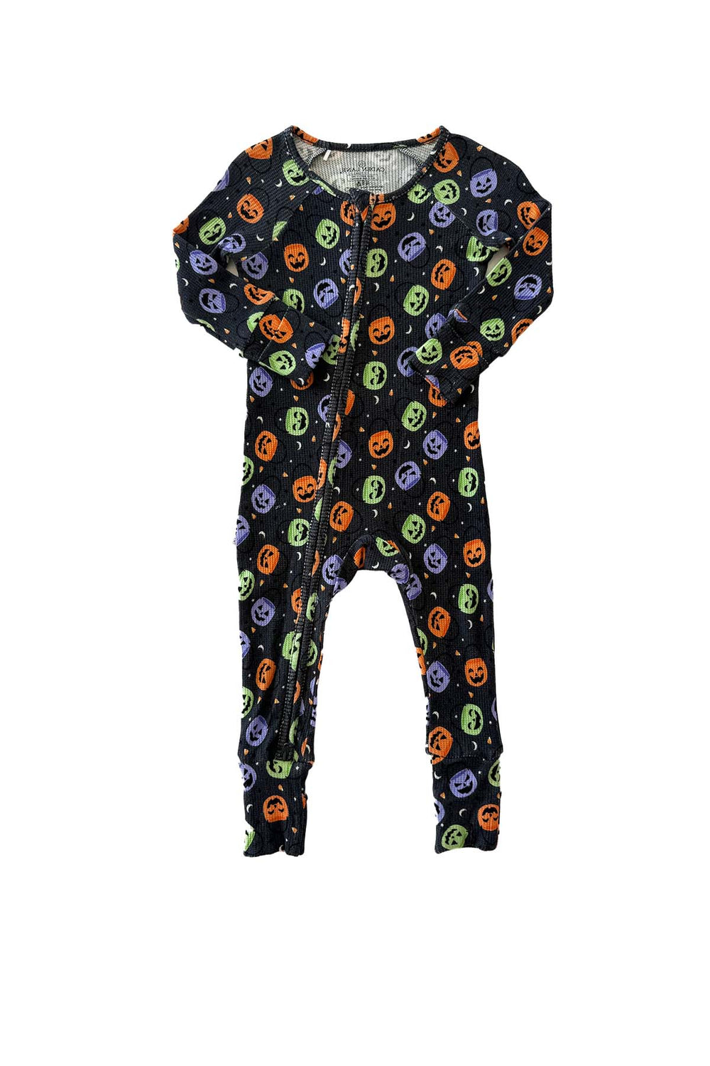 Bamboo waffle convertible zip romper in black with colorful jack-o-lantern print, laid flat with front zipper visible