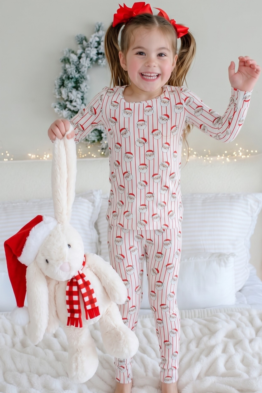 Girl holding the Caden Lane Christmas Bunny