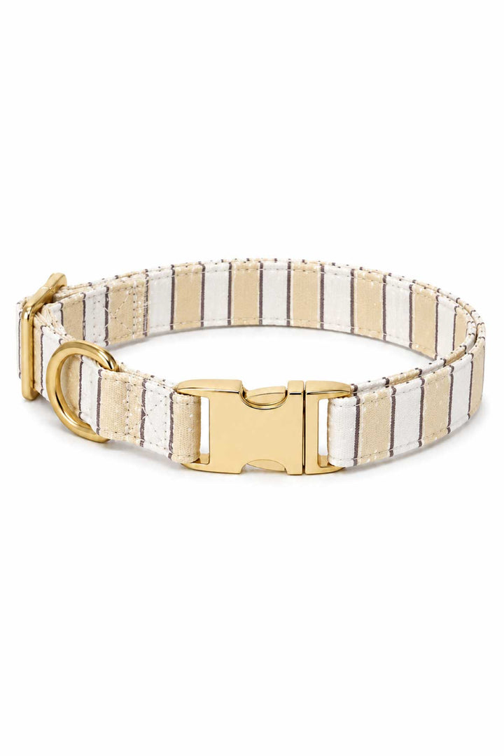 Dog collar in Biscuit Stripe pattern with tan and white vertical stripes, featuring a gold-tone quick-release buckle and D-ring