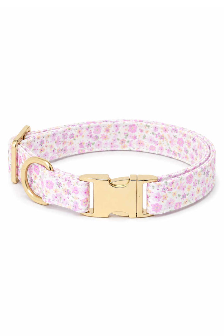 Dog collar in Scattered Blooms pink ditsy floral print with gold quick-release buckle and D-ring for leash attachment