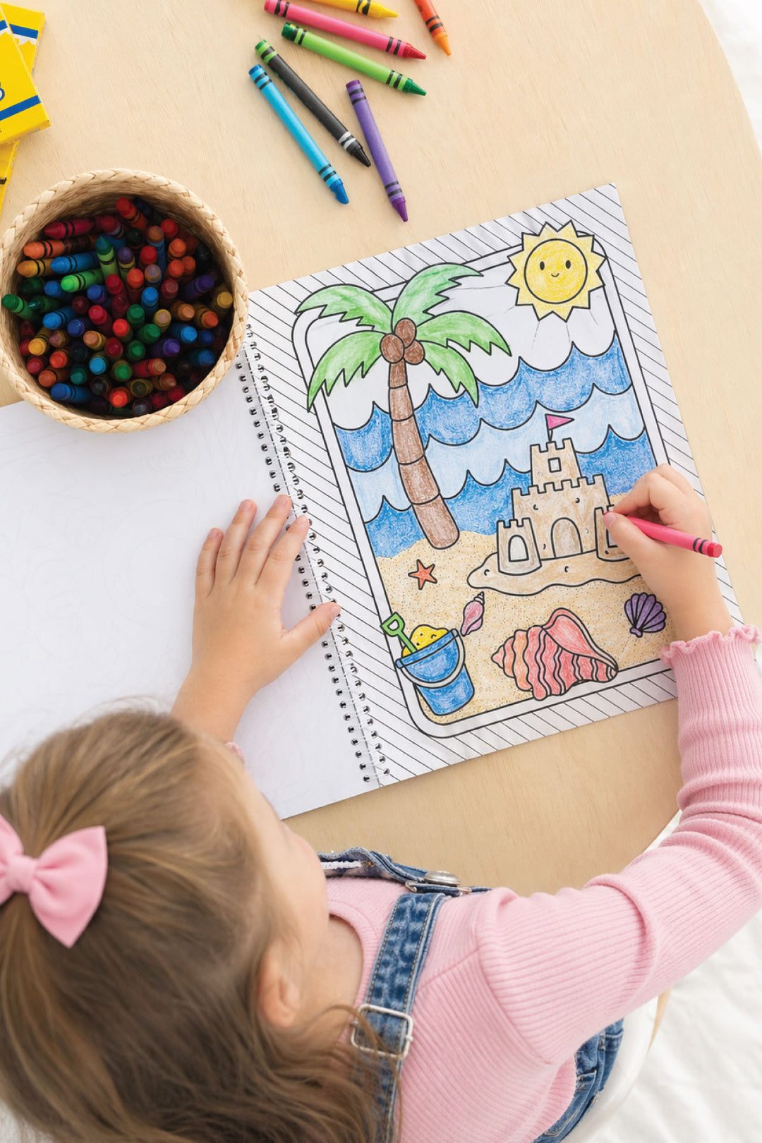 girl coloring beach themed coloring book