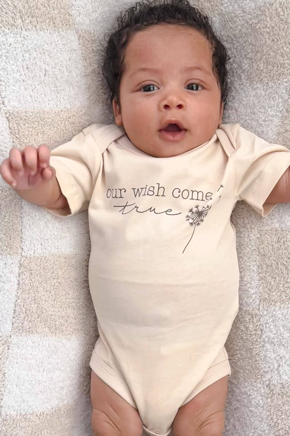 newborn in our wish come true graphic bodysuit in natural cotton from the conceive collection