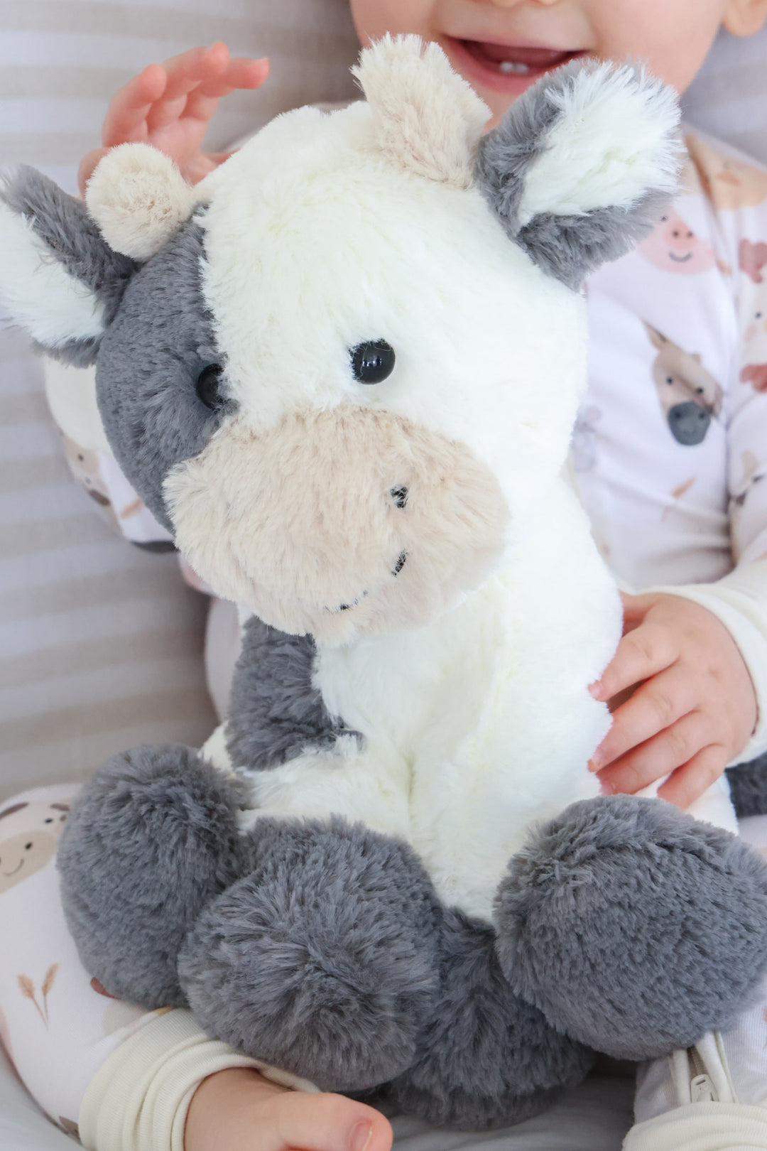 closeup of cocoa cow stuffed animal for kids 