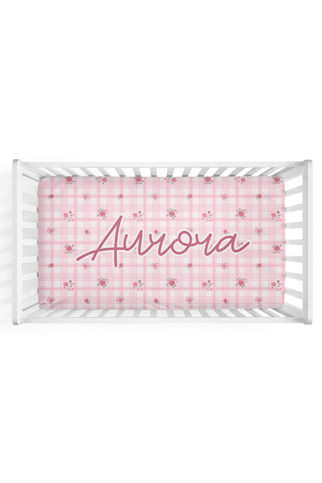 Personalized Primrose Plaid crib sheet with custom name in crib mockup