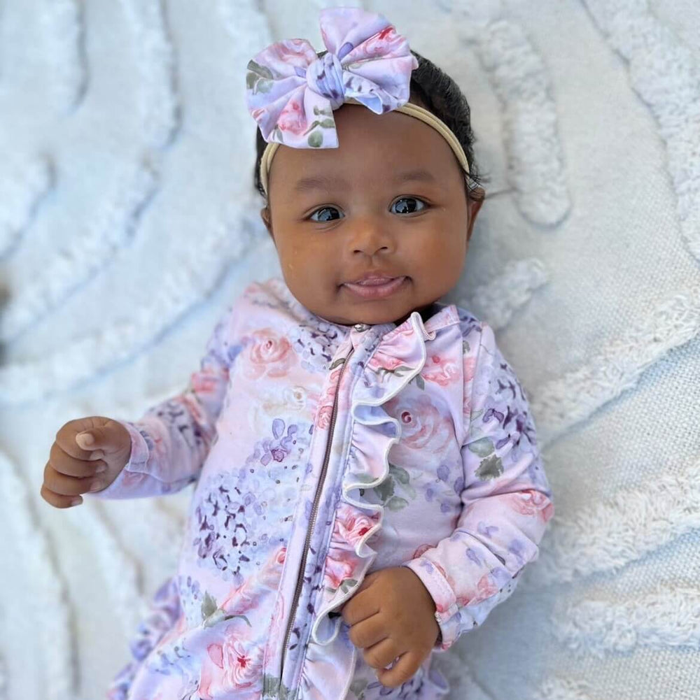 pink and purple knit bow headband for babies 