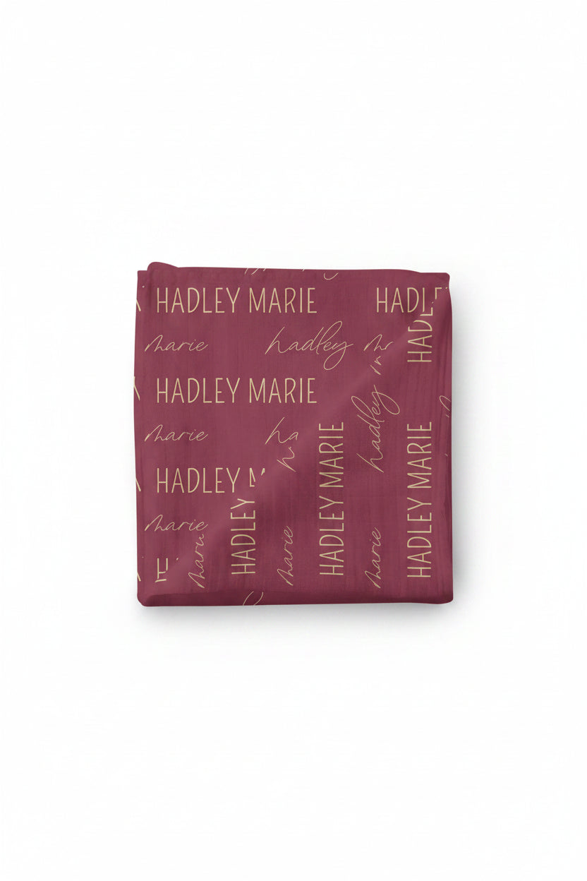 maroon and gold personalized swaddle 