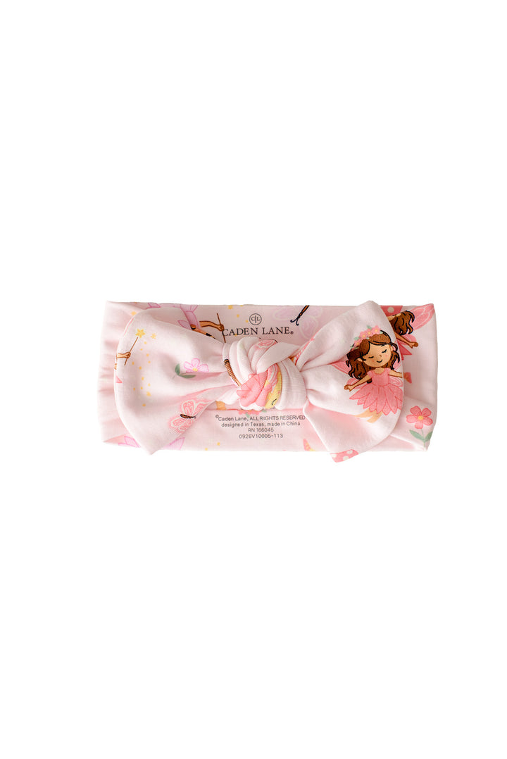Caden Lane headwrap in pink with fairies, flowers, and butterflies