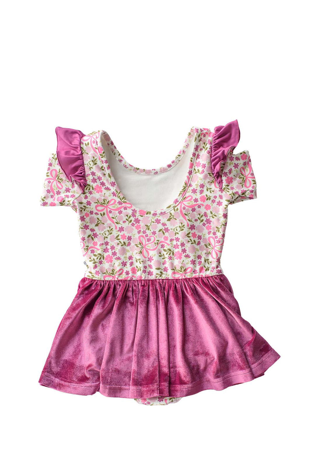 Back view flat lay of a Caden Lane leotard with a scoop back in a pink floral and bow print, featuring berry flutter sleeves and an attached berry velvet skirt.