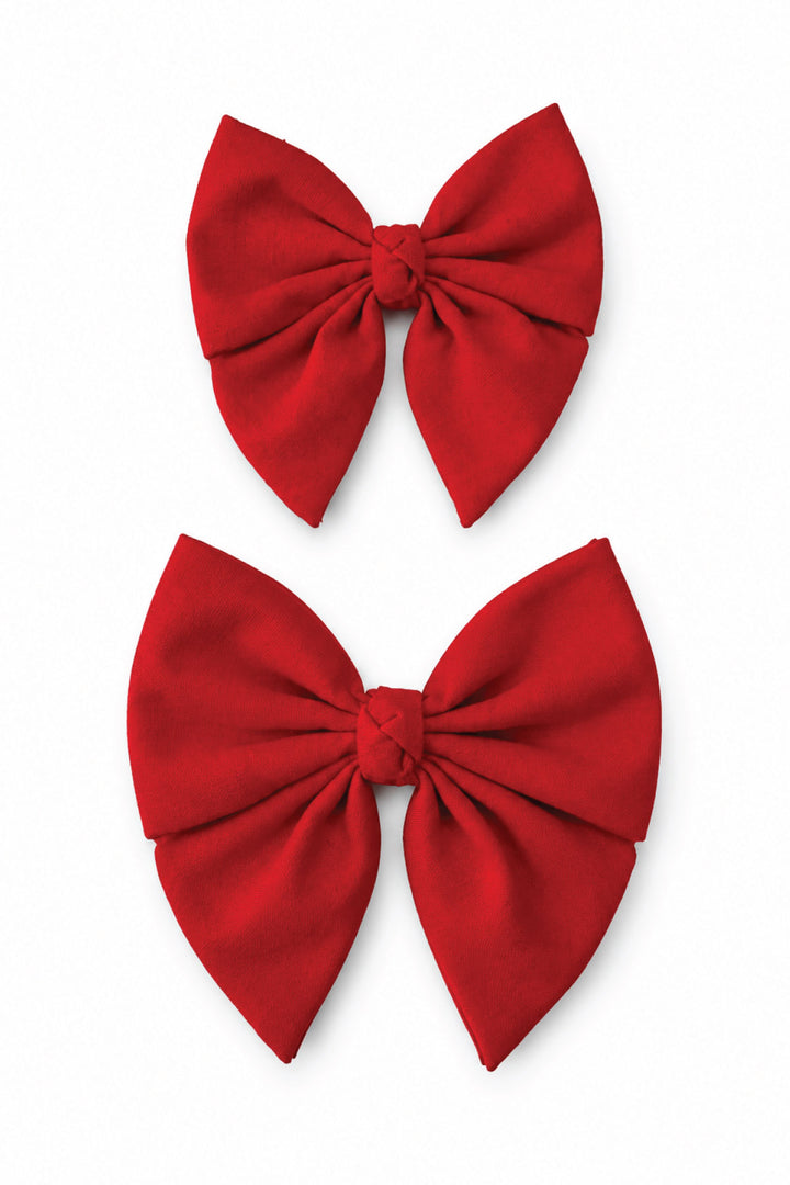Two Lane & Leash Fire Hydrant dog sailor bows in solid red, shown in small and large sizes on a white background