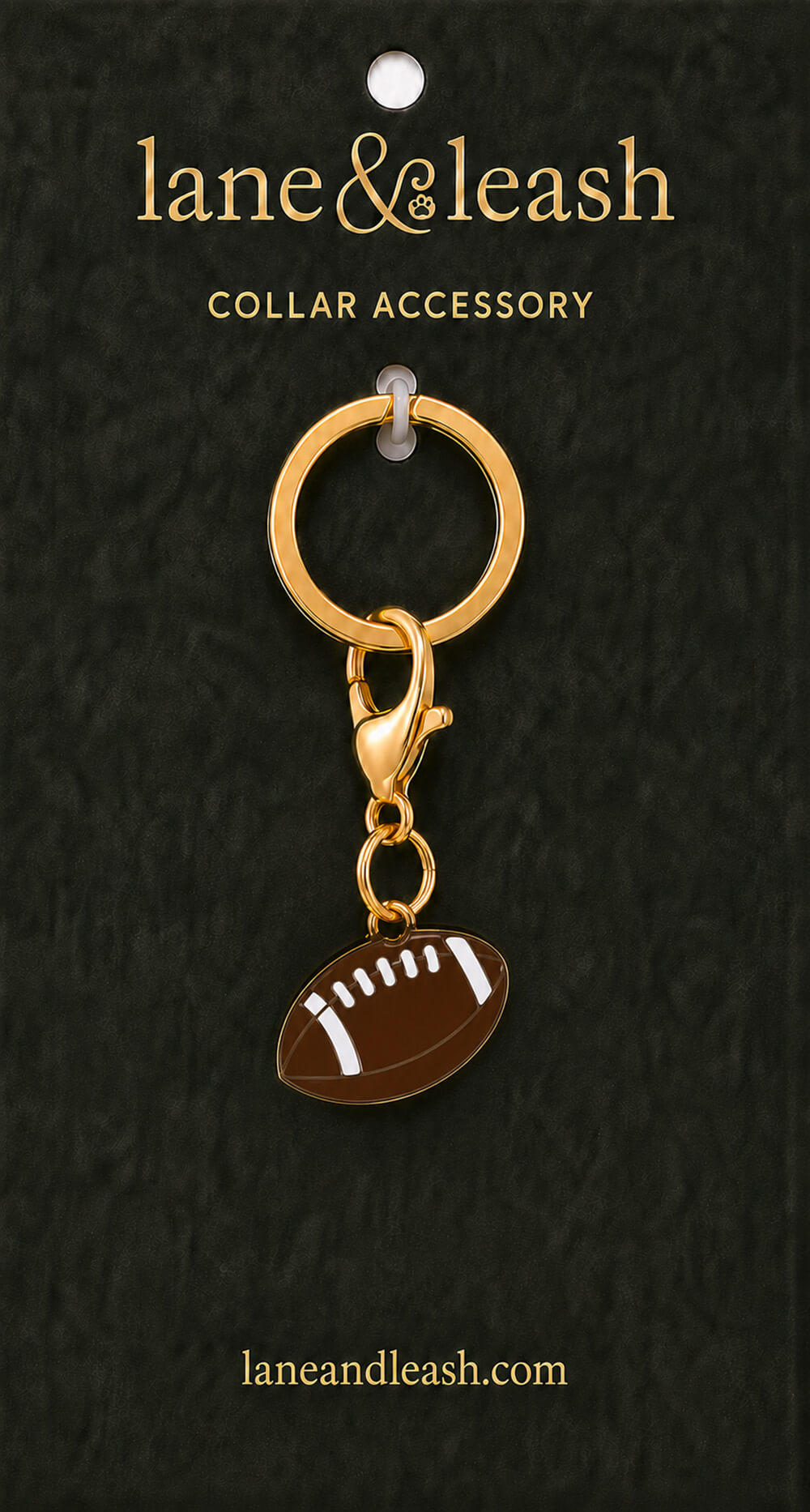Brown football Lane & Leash collar accessory charm displayed on dark green packaging card with lobster claw clasp and jump ring