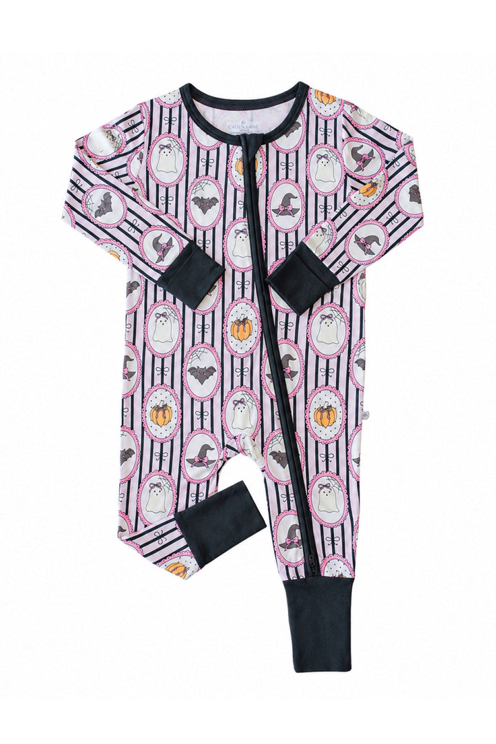 Caden Lane pink and black striped Halloween zip up romper with ghost, bat, and pumpkin cameo print. With black cuffs and zipper