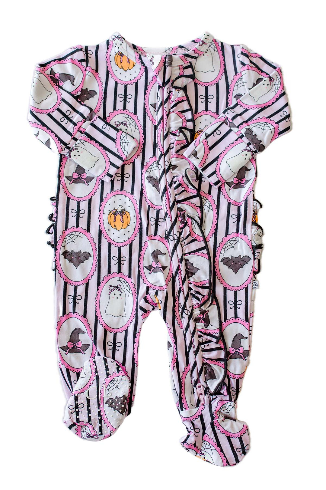 A baby footed one-piece romper with a Halloween print, featuring black and white vertical stripes, pink oval borders, and illustrations of ghosts, bats, witches, and pumpkins.