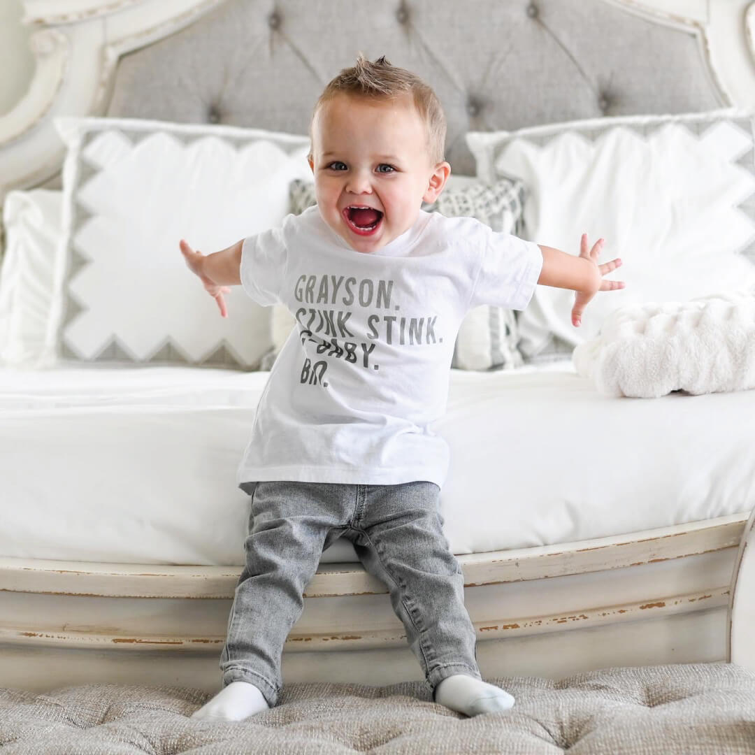 white graphic tshirt for kids with nickname green letters