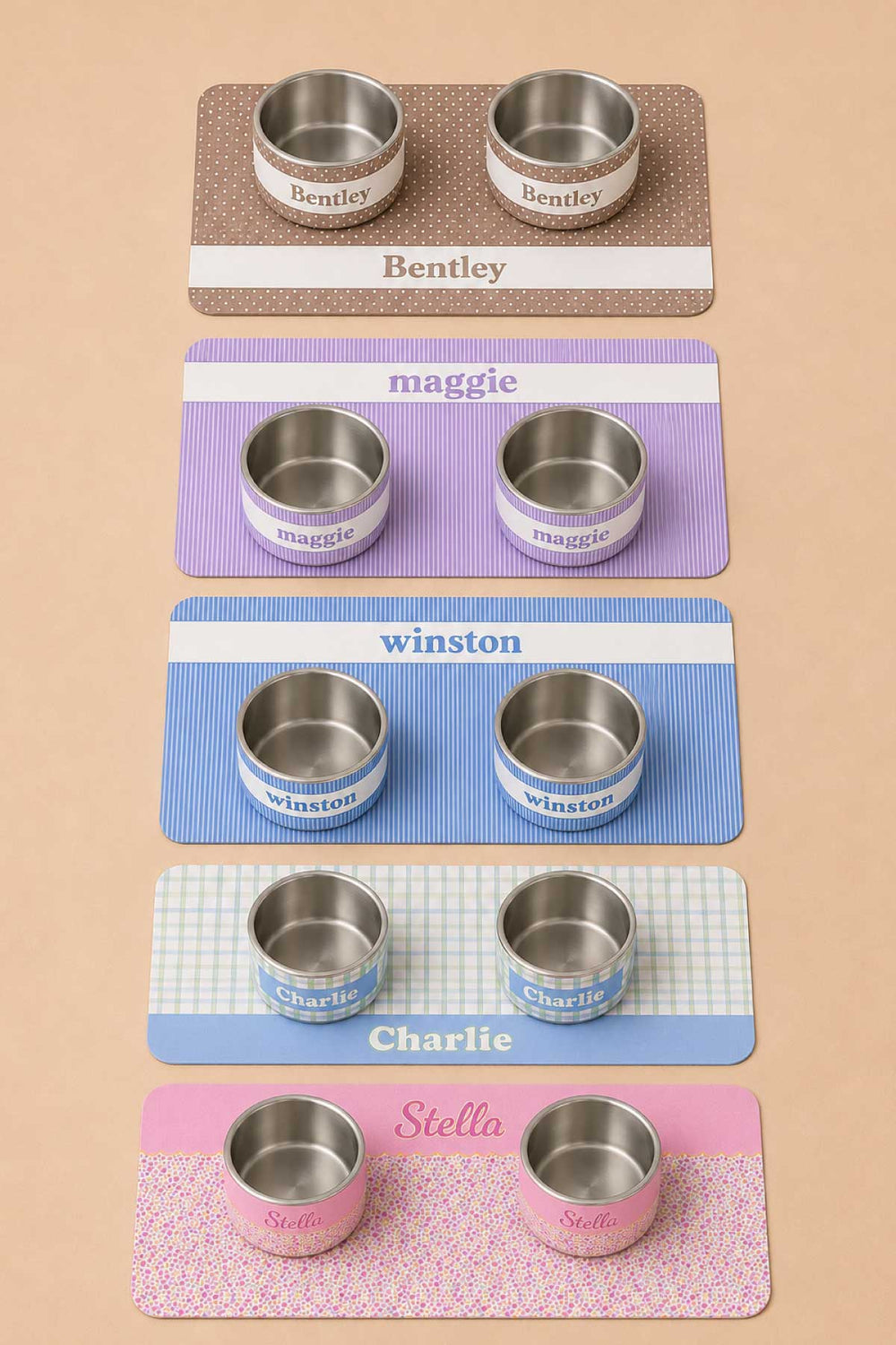 Group shot of five personalized pet placemats and double bowl sets in various prints and colors showing customization options