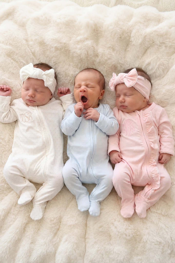 babies in picot trim outfits with matching bow headwraps 2