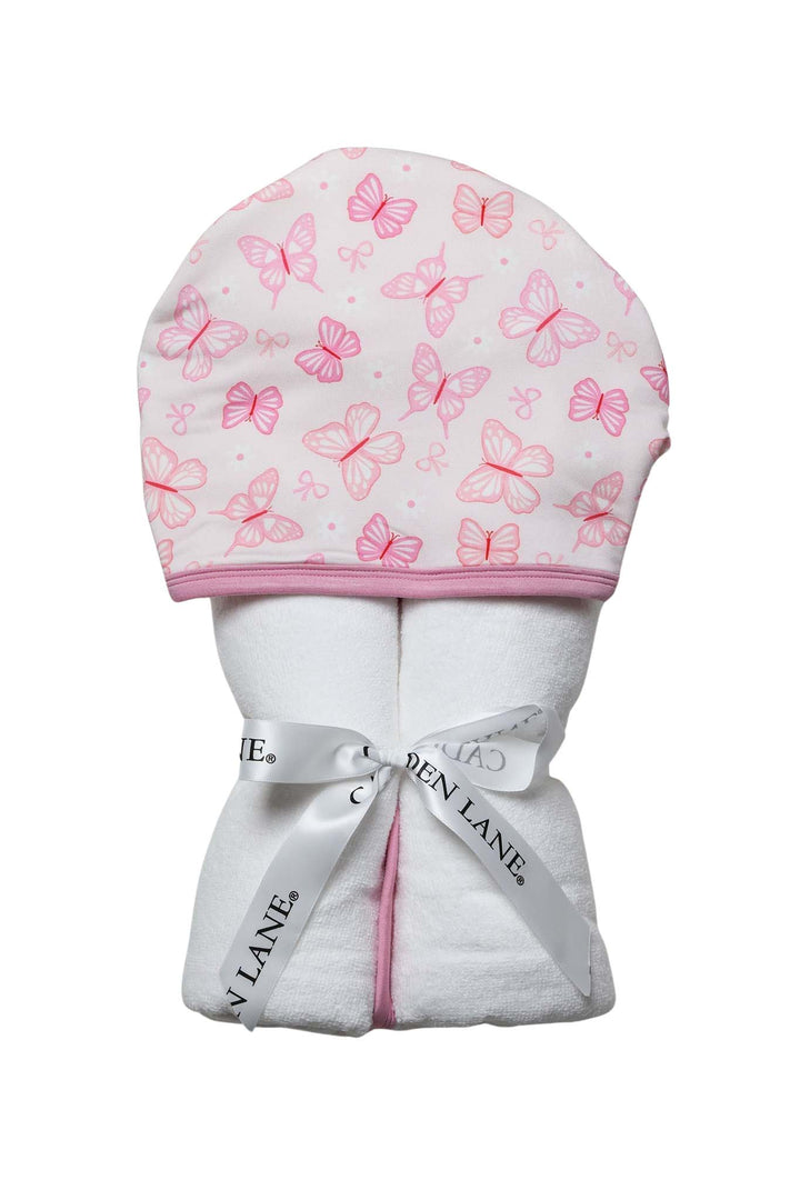 Embroidered Bamboo Hooded Towel in Blooming Butterflies print - towel folded upright with hood showing pink butterfly print and tied with a Caden Lane satin ribbon bow