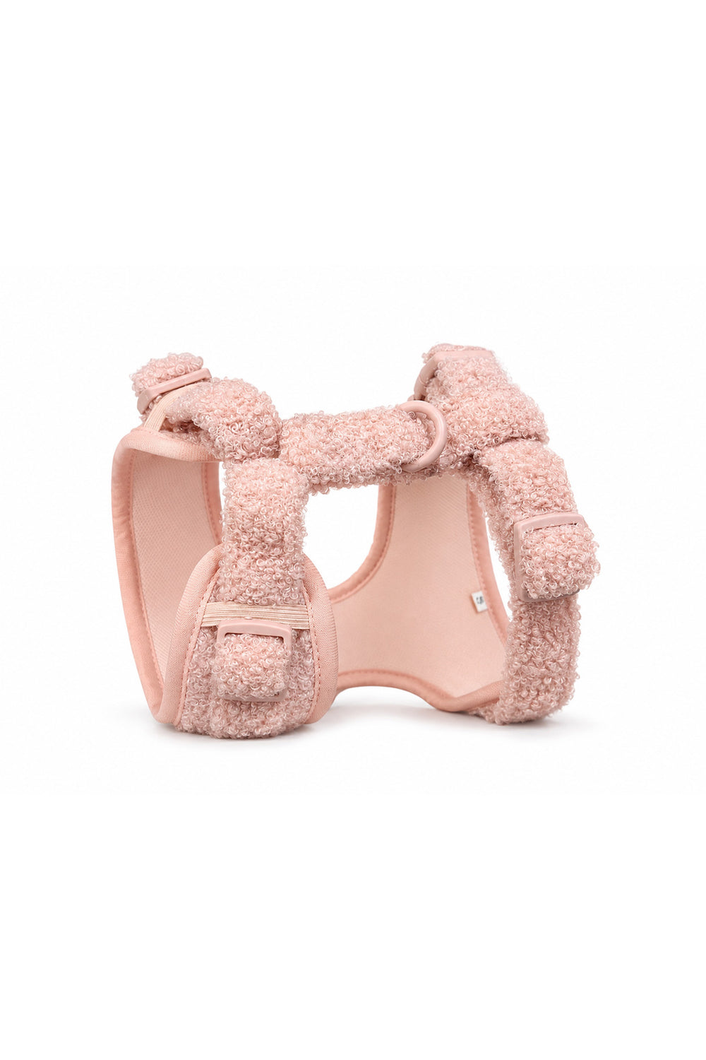 A Lane & Leash light pink plush fleece dog harness with adjustable straps and a matching pink plastic buckle, shown on a clean white background.