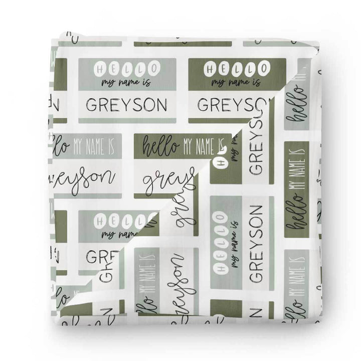 hello my name is green block swaddle 